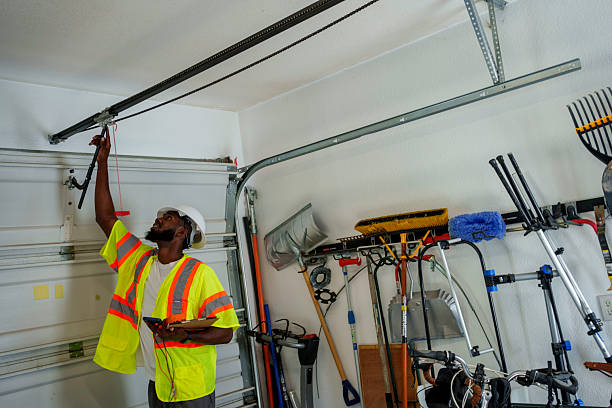 Professional Garage Door Panel Replacement technician working in Anaconda, MT